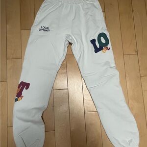 Madhappy White Joggers with Colorful Lettering